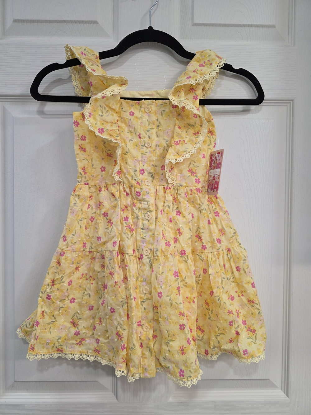 Girls btween Yellow Floral Ruffle Dress with Pink Accents And A Matching Hat